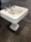 Vintage porcelain over cast iron bathroom pedestal sink