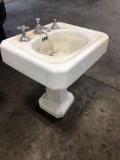 Vintage porcelain over cast iron bathroom pedestal sink