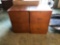 2 matching wooden file cabinets