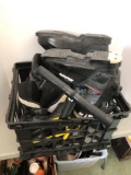 Ski boots(size unknown), exercise cables, plastic storage crate