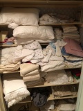 Contents of closet(linens,pillows,blankets,more;must bring own boxes)