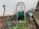 Garden hose with creel, sprinkler can