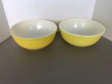 Yellow PYREX mixing bowls