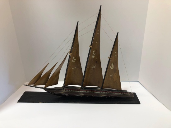 Vintage wooden model sailboat