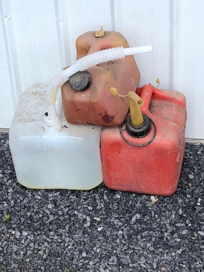 3 plastic gas cans