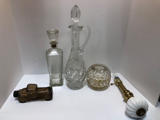 2 decanters,candle holder,Avon bottle,more