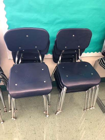Eight children's classroom chairs