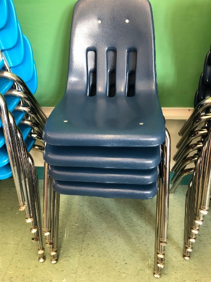 Four plastic chairs