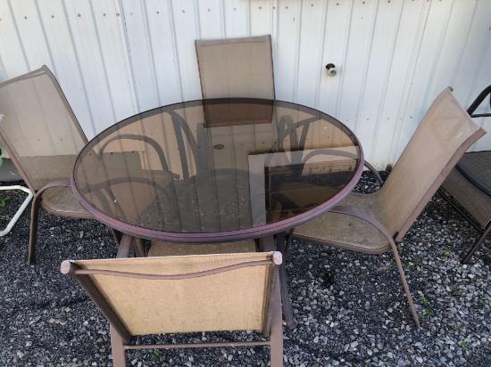 Outside glass top table/4 chairs