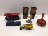 Vintage wooden trucks,wooden letter blocks, vintage tin/litho noisemaker,tin/litho caboose,more