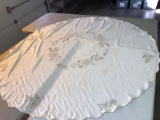Antique embroidered oval linen table cloth(approximately 61x66)