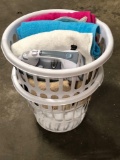 2 plastic laundry baskets,towels,electric iron