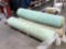 Four rolls of carpet padding