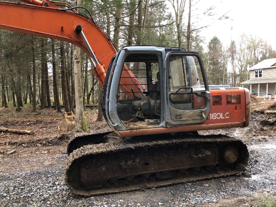 HITACHI track hoe(EX160LC;new main boom/42" tooth bucket;incab bucket disconnect;(6170 hours)