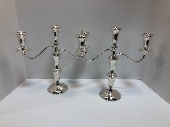 2 matching STERLING silver candlesticks
