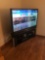 JVC 55? flatscreen TV, TV stand