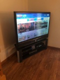 JVC 55? flatscreen TV, TV stand