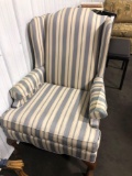 High back blue and white stripped fabric chair