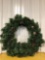 Artificial Christmas wreath lighted with pinecones 30 inches in