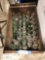 Assorted antique pop bottles and wooden crate