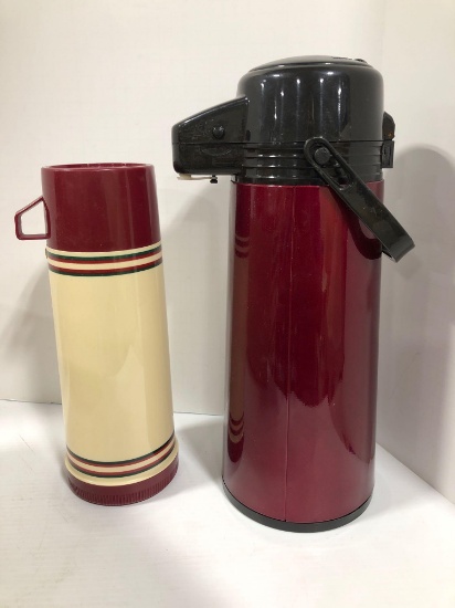 Assorted thermoses travel mugs and coffee carafe