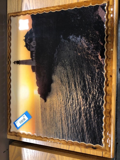Lighthouse picture laminated on wood backing