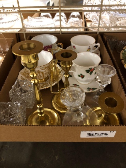 Assorted tea cups and candle holders