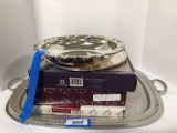 Assortment of silverplate serving trays and platters