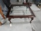 BEVELED GLASS TOP AND WALNUT COCKTAIL TABLE WITH CHIPPENDALE LEGS APPROX 38