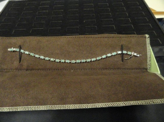 8 INCH BRACELET MARKED 925 INDIA AND 24 JADE TYPE STONES BY ROSS AND SIMONS