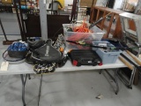 TABLE LOT OF SPORTING GOODS AND YARD TOOLS INCLUDING HELMETS TENNIS RACKETS