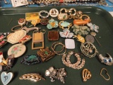 COLLECTION OF PINS AND BROOCHES AND EARRINGS