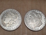 TWO MORGAN SILVER DOLLARS 1884 AND 1899 AND GEORGE WASHINGTON MEMORATIVE CO