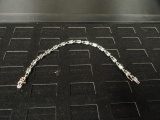 STERLING BRACELET WITH 15 AQUA STONES 7 INCH LONG TOTAL WEIGHT .32 T OZ