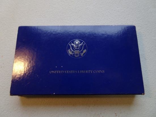 US LIBERTY COINS 1886-1986 IN BOX WITH CERTIF