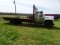 #111 1975 INTERNATIONAL LOADSTAR 1600 SHOWING 13686 MILES 4 SP TRANS 20' FL