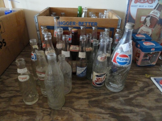 COLLECTION OF PEPSI BOTTLES AND PEPSI CRATE INCLUDING BURTON RUARK SODA BOT