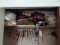 CONTENTS OF CLOSET TO INCLUDE PURSES SHOES BREIF CASE AND MORE