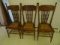 THREE OAK PRESSED BACK CHAIRS WITH BASKET WEAVE SEATS IN GOOD CONDITION