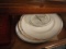 CONTENTS OF BOTTOM OF CHINA CUPBOARD TO INCLUDING SERVING PLATTERS DISHES P