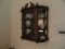 WALL HUNG MIRRORED BACK CURIO WITH CHILDRENS TEA SET AND OTHER COLLECTIBLES