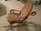 ANTIQUE CHILDS RATTAN ROCKER WITH BASKET WEAVE SEAT