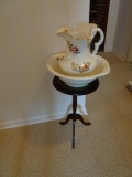 SMALL MAHOGANY PEDESTAL TABLE WITH WASH BOWL AND PITCHER