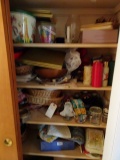 CONTENTS OF CLOSET TO INCLUDE BASKETS CANDLES BOWLS TABLECLOTHS AND MORE