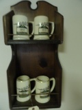 WALL MOUNTED SHELF WITH FOUR ADKINS ENTERTAINMENT MUGS