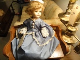 ANTIQUE DOLL ON BENCH EYES ARE WORKING NO MARKS FOUND