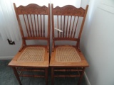 PAIR OAK PRESSED BACK SIDE CHAIRS WITH BASKET WEAVE SEATS