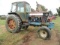 FORD TRACTOR 2 WD ENCLOSED CAB ROUGH CONDITION SHOWING 3300 HRS