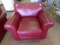 OVERSTUFFED RED LEATHER CHAIR BY COIL AND CORE SUPERIOR SEATING FOUNDATION