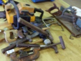 TABLE LOT INCLUDING SAWS MALLETS HAMMERS PIPE CUTTER AND CHAIN SAW